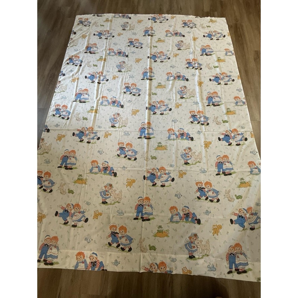 Vintage sheet and pillowcase featuring Raggedy Ann and Andy